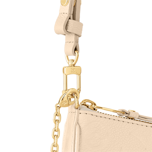 Easy Pouch On Strap Monogram Empreinte 皮革 in 女士's 錢包及小型皮件 女裝錢包、皮夾及小型皮件總覽 collections by Louis Vuitton (產品縮放)